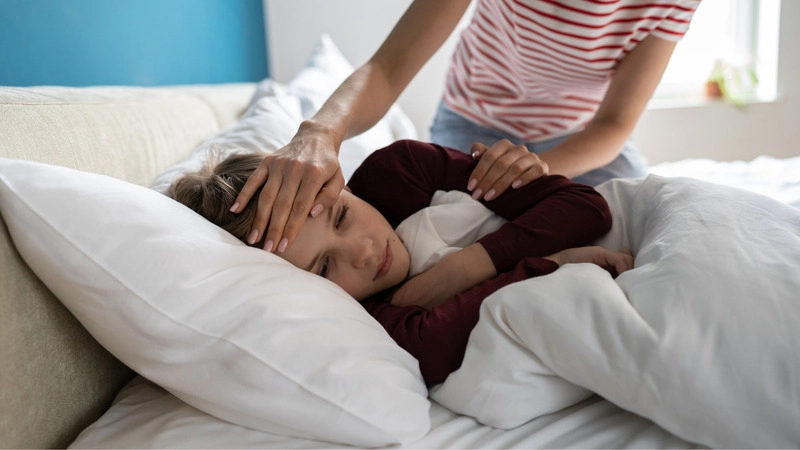 mọc răng khôn bị sốt