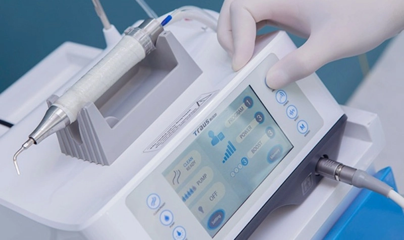 nhổ răng khôn bằng máy siêu âm piezotome